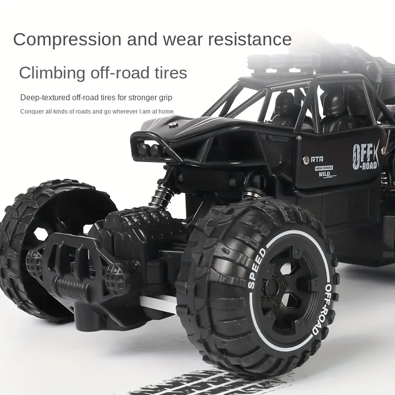 Black off-road RC crawler with oversized tires, designed for climbing and rough terrain.