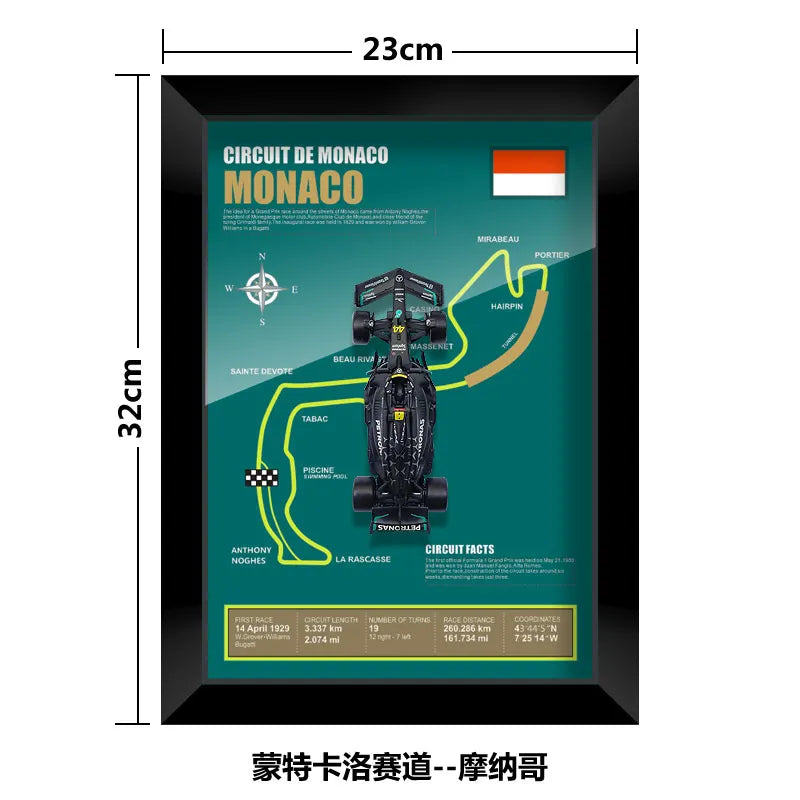 Monaco Grand Prix circuit poster in a black frame. Features race car and track map with key locations labeled.