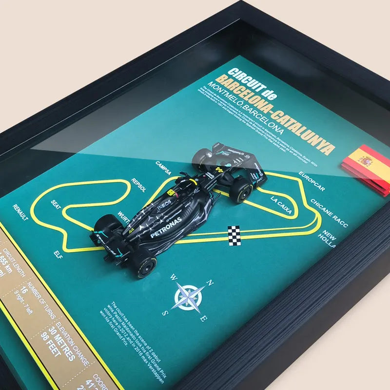 Framed art print of Circuit de Barcelona-Catalunya with F1 car model and Spanish flag.