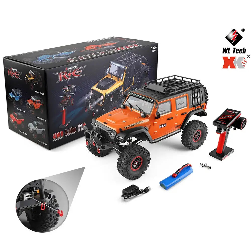 Orange WL Tech 1/10 Scale RC Rock Crawler Truck with Remote, Battery, and Charger.
